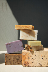 Handmade soap from natural ingredients, various herbs. Concept of sustainable use, bath products. Front view