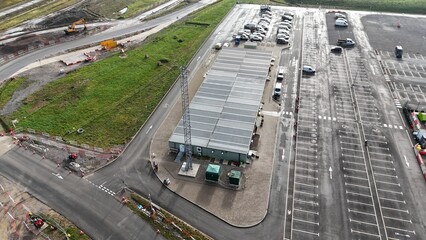 an overhead view of the parking lot of a commercial business