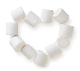 Marshmallows in the shape of a heart on a white background. Top view