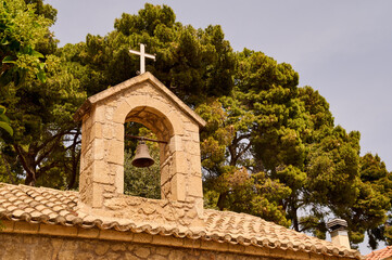 The roof of the stone belfry