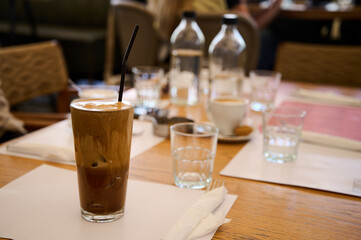 Frappe on table blur background