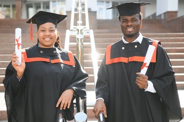 Happy African American students on their graduation day