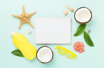 Summer banner with coconut and sea shells on color background. Vacation concept