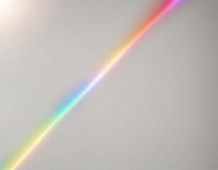 A texture overlay effect of blurred rainbow light refraction for photos and mockups. Organic diagonal holographic flare on a white wall. Realistic natural light effects.