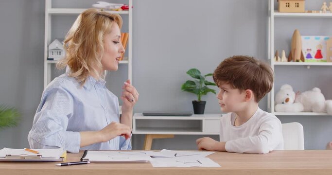 Speech therapist doctor, teacher or logopedist is practicing a language exercise with a child, focusing on improving communication skills. Speech therapy in enhancing a child language development.