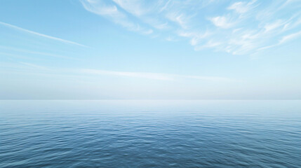 Obraz premium Serene seascape with calm blue water. Peaceful ocean scene with tranquil blue water and soft clouds, ideal for travel and nature projects.