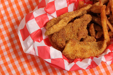 Close-up of chicken nuggets on a checkered tablecloth