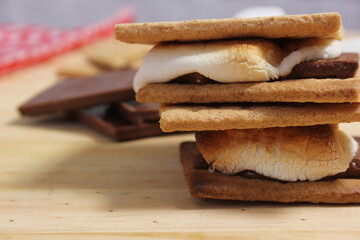 Close-up of marshmallows and chocolate on a table