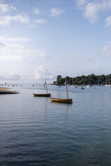 Boats floating in the serene water