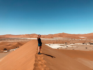 person walking in the desert, namibia