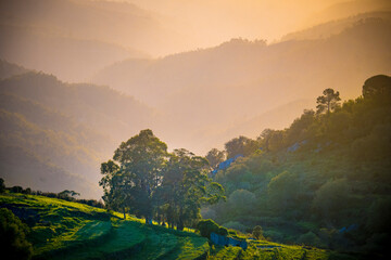Hazy sunset view in a valley around mount Foia on Monchique, Portugal
