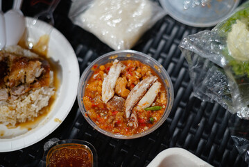 Crab meat chili paste on a black rattan table