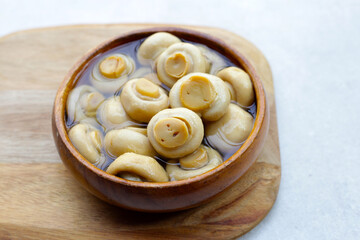 Champignon mushrooms in brine. Canned champignon mushrooms whole