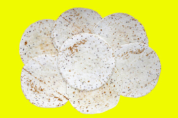 Quinoa tortilla wraps on yellow background