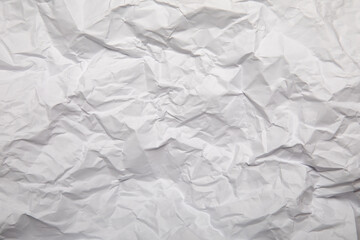 Piece of white wrinkled paper texture background 