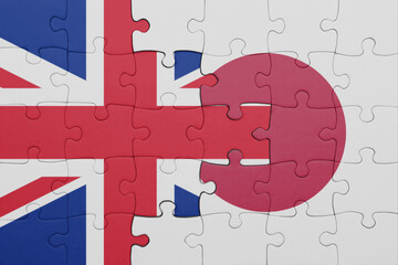 puzzle with the colourful national flag of japan and flag of great britain.