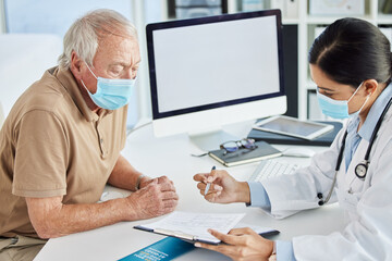 Senior man, face mask and doctor in office for consultation, clipboard and talking on results. Male...