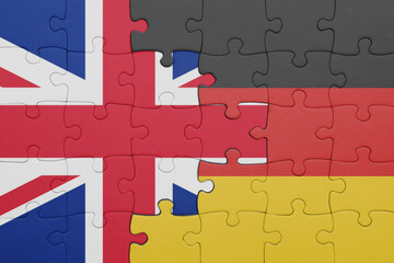 puzzle with the colourful national flag of germany and flag of great britain.