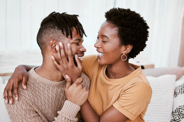 Touch, black couple and embrace in living room, man and woman with love, romance and relax in home...