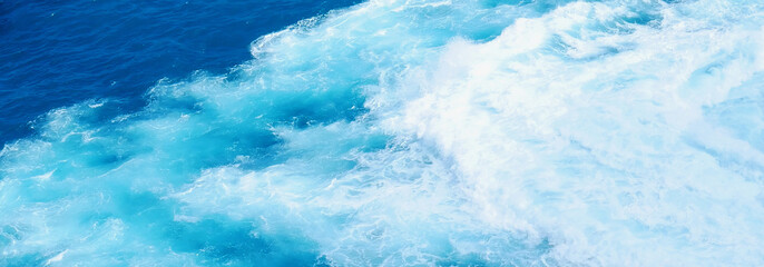 Banner Turquoise ocean sea water white wave pattern splashing deep blue sea. Banner Tropical sea...