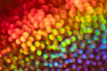 Abstract bokeh background from rainbow colored sparkles