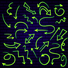 a set of neon arrows in bright green and yellow colors