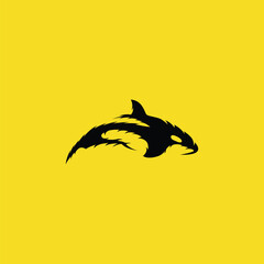 black orca whale with a simple and modern design on a yellow background