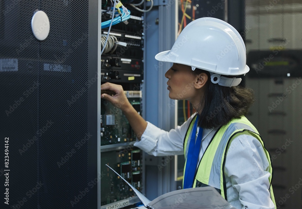 Fototapete Network engineer, data center and server room for internet infrastructure and lights of computer. Woman, IT support and cybersecurity with neon, software and company information for cloud computing