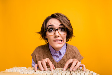 Photo portrait of attractive young woman type keyboard nervous bite lips dressed retro office...