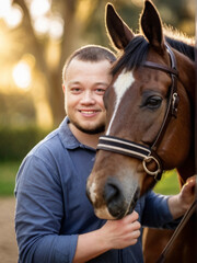 Heartwarming bond between young man with Down syndrome and horse. Experience of the power of equine therapy during beautiful summer day.