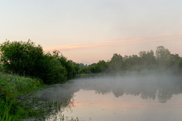 Fototapeta premium Fog on the river at dawn