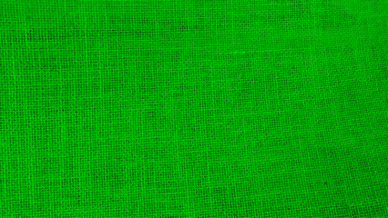 Green burlap jute texture background.