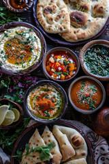 Eid Bread and Rich Dips Texture, Eid feast, Islamic celebration, Family feast.