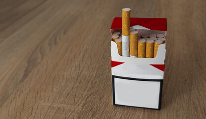 Pack of cigarettes on wooden textured table