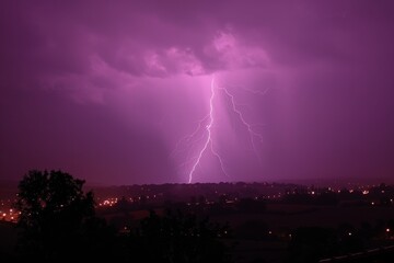 Purple Lightning Bolt Over City