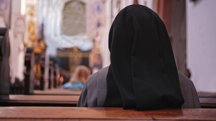 Catholic Nun Wearing Grey Religious Habit Tunic Saying Prayer During Holy Mass