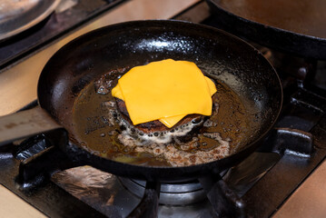 cooking, assembly and manufacturing of homemade hamburgers with ground meat and chef making the medallions step by step, the total assembly of all the ingredients
