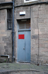 Deserted Alley with Rear Access Door to Shop