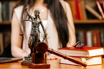 Close-up of a lawyer or judge's workplace with a fimida on the table. Concept of legal law,...