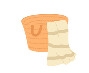 A beach bag made of straw with a towel.