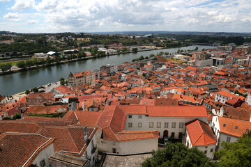 Panoramic view of the cityscape Coimbra and the River Mondego, Portugal.