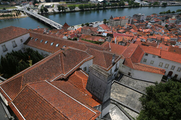 Panoramic view of the cityscape Coimbra and the River Mondego, Portugal.