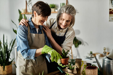Two older women, a loving mature lesbian couple, working together in the garden.