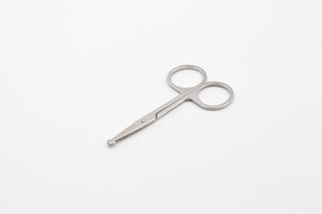 Silver metal scissors on a white background, Scissors for sewing on white background, Very sharp retro professional tailor scissors