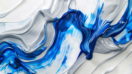 Sapphire blue and light grey oil paint elegantly swirled on a white canvas, suggesting the soothing...
