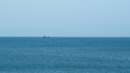 Fishing Boat Trawler Ship Sailing On Sea. Fishing Boat Sailed From The Coast. Real time. © artifex.orlova