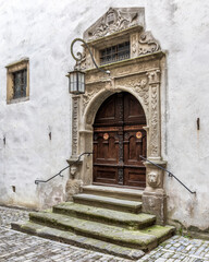 Medieval wooden door at Rothenburg ob der Tauber's Town Hall, Bavaria, Germany.