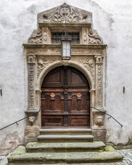 Medieval wooden door at Rothenburg ob der Tauber's Town Hall, Bavaria, Germany.