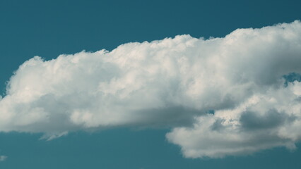 Nature Dark Blue Sky With Clouds Background. Bright Clear Skyline With Beautiful Cloudscape.