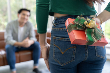 young couple surprise a gift
